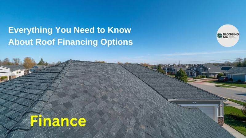 Homeowner reviewing roof financing options on laptop at kitchen table